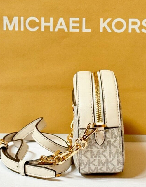 Load image into Gallery viewer, MICHAEL KORS JET SET GLAM SMALL FRONT POCKET OVAL CROSSBODY BAG MK LIGHT CREAM
