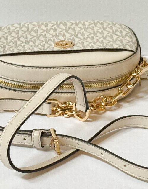 Load image into Gallery viewer, MICHAEL KORS JET SET GLAM SMALL FRONT POCKET OVAL CROSSBODY BAG MK LIGHT CREAM
