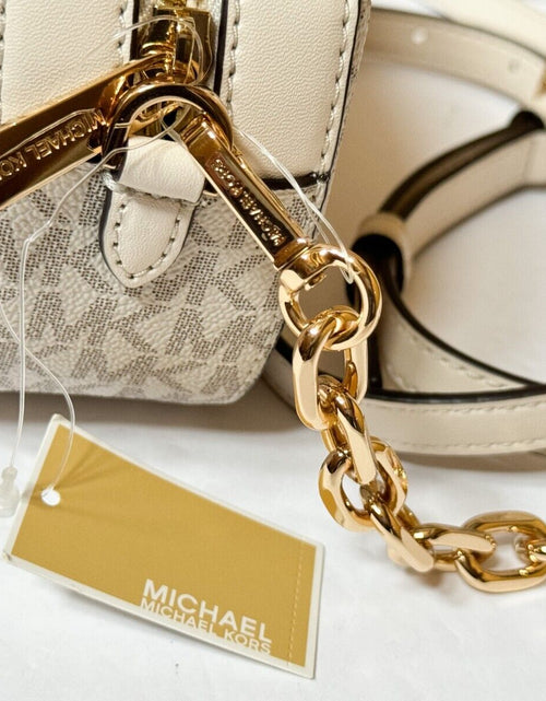 Load image into Gallery viewer, MICHAEL KORS JET SET GLAM SMALL FRONT POCKET OVAL CROSSBODY BAG MK LIGHT CREAM
